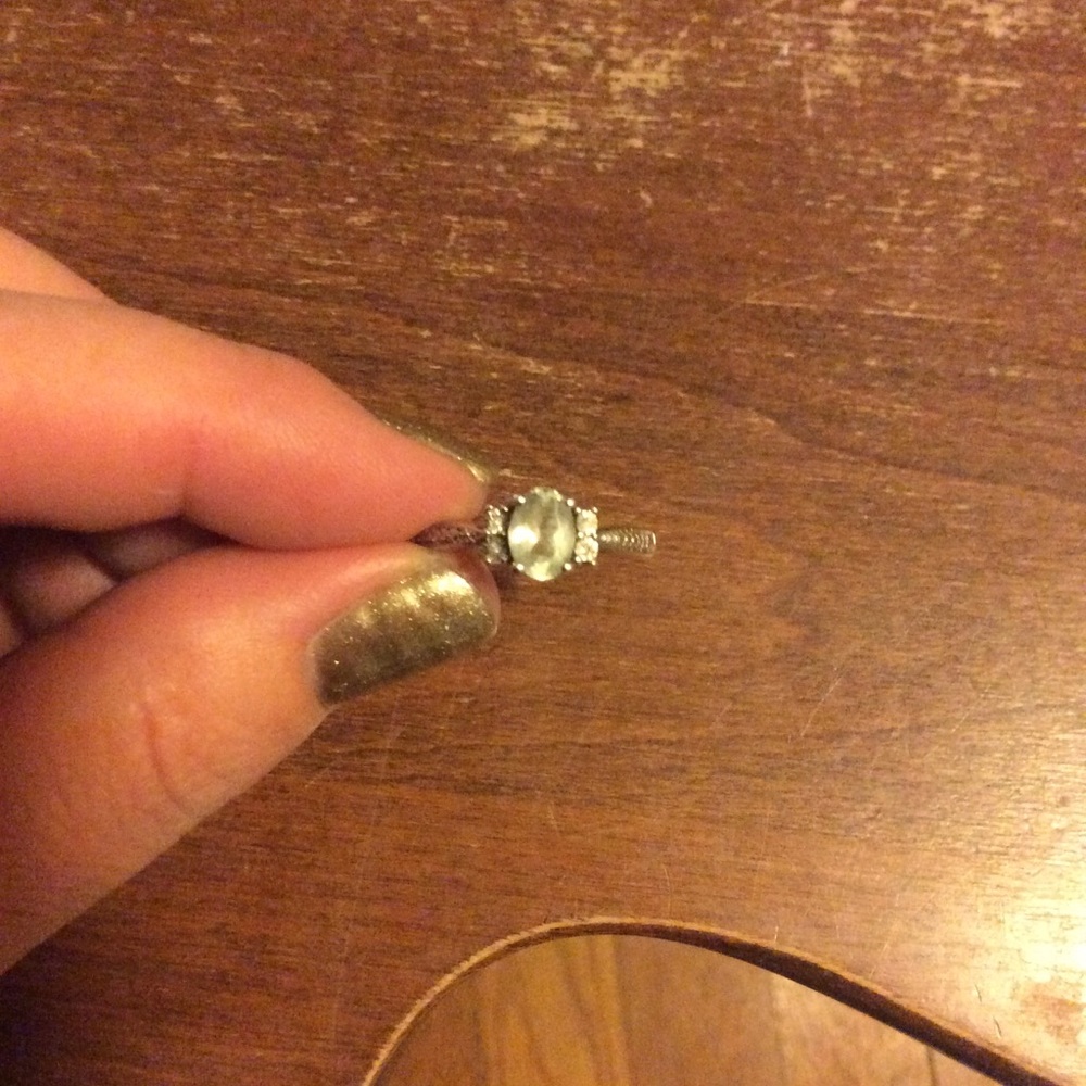 Green and clear crystal ring in silver